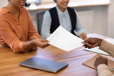 man holding contract his new office job after interview (1)